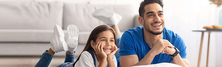 Is streaming the best way to watch live sports without cable? - Dad and daughter watch TV together